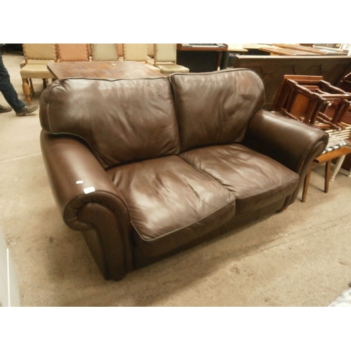 656 - Large brown faux leather cushioned settee