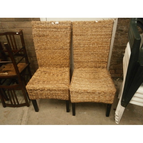 662 - Pair of large woven dining chairs