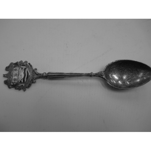 319 - Display shelf containing souvenir spoons, six spoons are silver hallmarked.