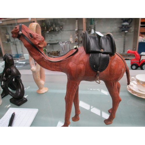 430 - Two leather camel figurines