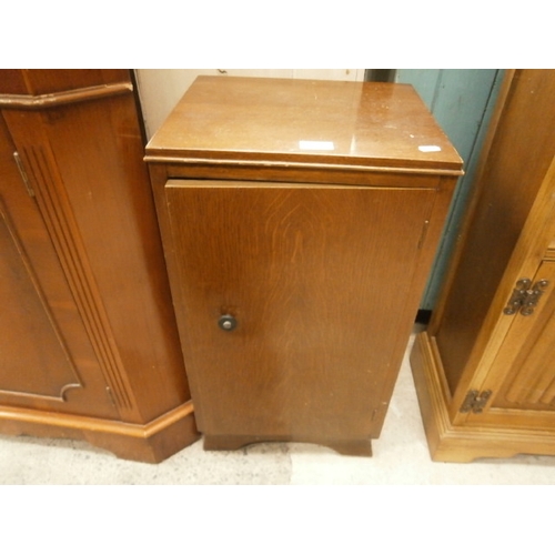 701 - Oak bedside cupboard in good condition