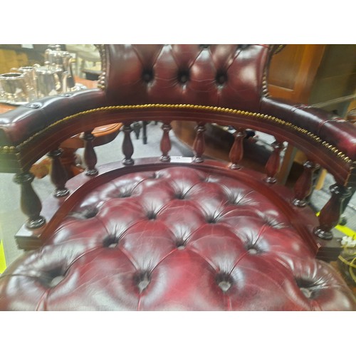 7 - Red leather chesterfield buttoned captains chair in very good condition