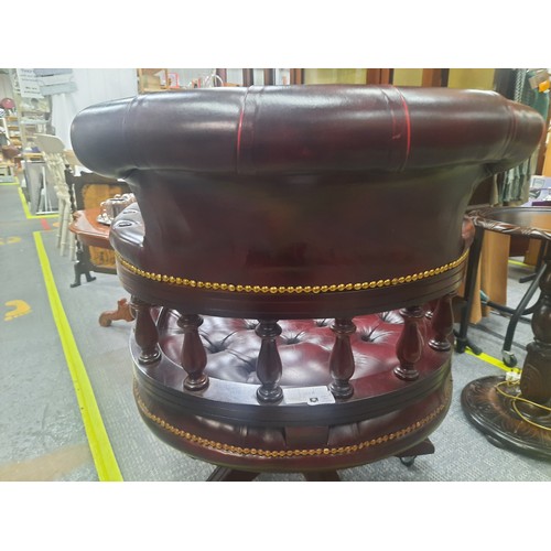 7 - Red leather chesterfield buttoned captains chair in very good condition