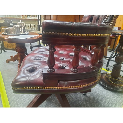 7 - Red leather chesterfield buttoned captains chair in very good condition