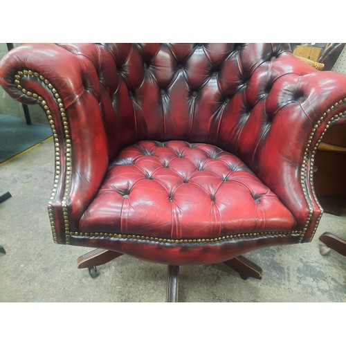 9 - Red leather chesterfield buttoned directors chair in very good condition