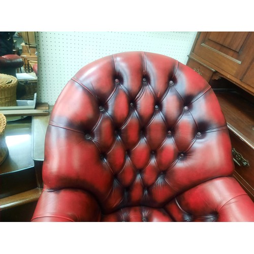 10 - Red leather chesterfield buttoned directors chair in very good condition