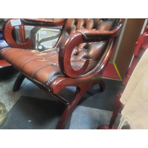 11 - Brown leather chesterfield buttoned slipper chair in very good condition