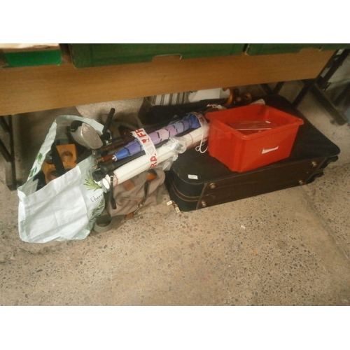 135 - Lot inc suitcase, golf clubs, umbrellas, walking sticks, etc