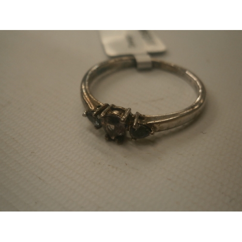255 - Silver ring stamped 925 with 3 stones weight 2.19G size R
