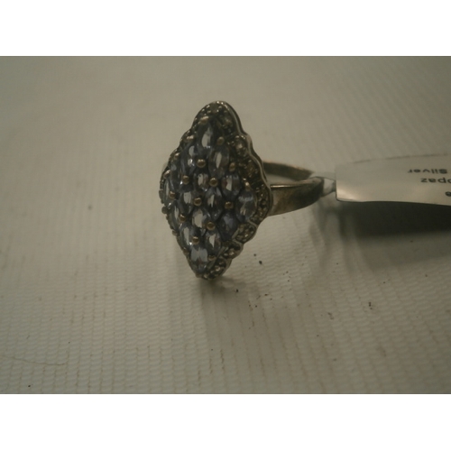 257 - Tanzanite & white topaz sterling silver ring stamped 925 weight 3.61G silver & 1.21cts stones with c... 