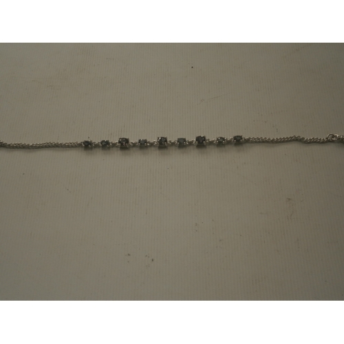 267 - Silver bracelet stamped 925 with 9 stones