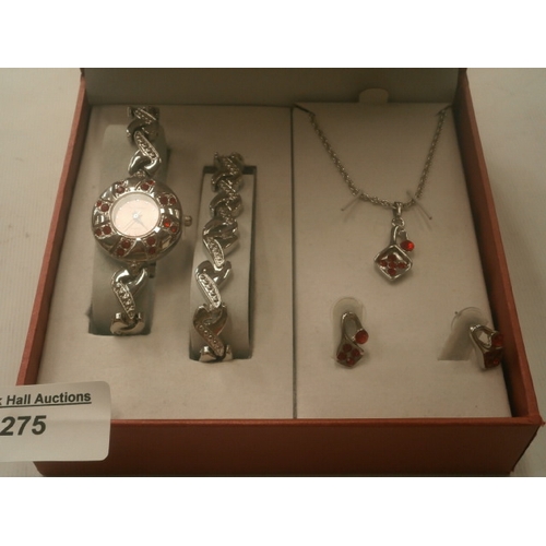 275 - Ladies gift set inc watch , bracelet , chain etc watch is new