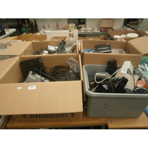 282 - Four boxes inc digital boxes, assorted cables, telephones, etc