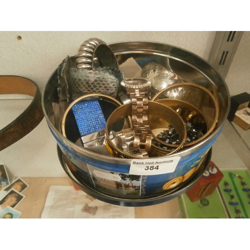 384 - Tin including watches and bracelets
