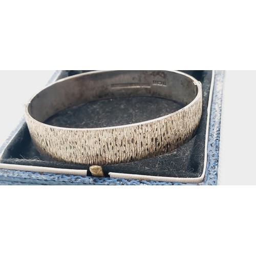 245 - Hallmarked silver bracelet by Henry little & son weight 27.95G in original case