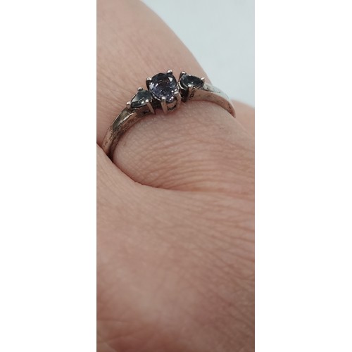 255 - Silver ring stamped 925 with 3 stones weight 2.19G size R