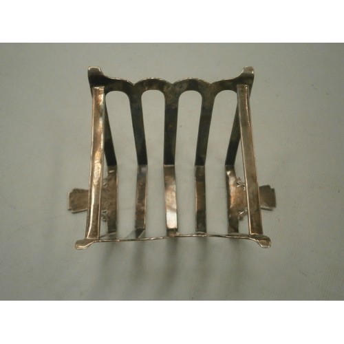 43 - Silver hallmarked toast rack weight 87G
Birmingham stamps