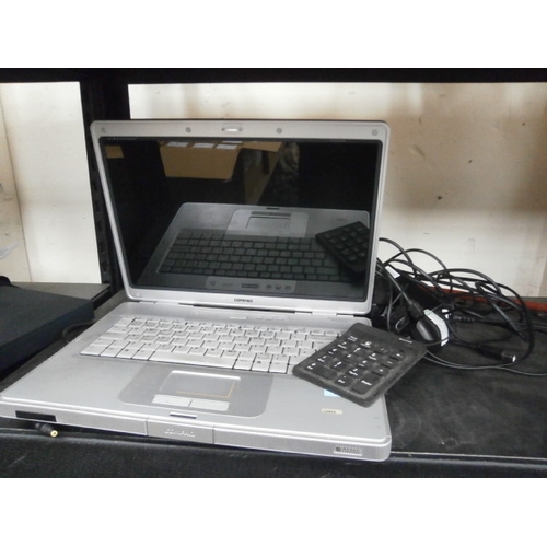 79 - Old Compaq laptop with charger
