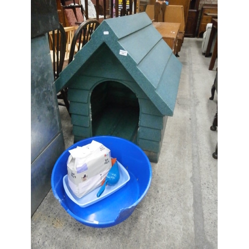 604 - Dog's plastic kennel with puppy bed, tray etc