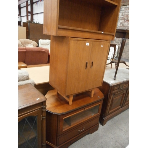 688 - Glazed TV stand cabinet, a retro teak record cabinet and a small open bookcase