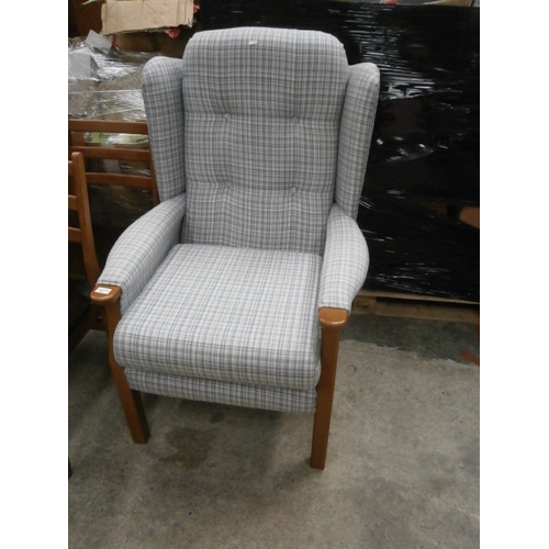 700 - Upholstered wing back armchair