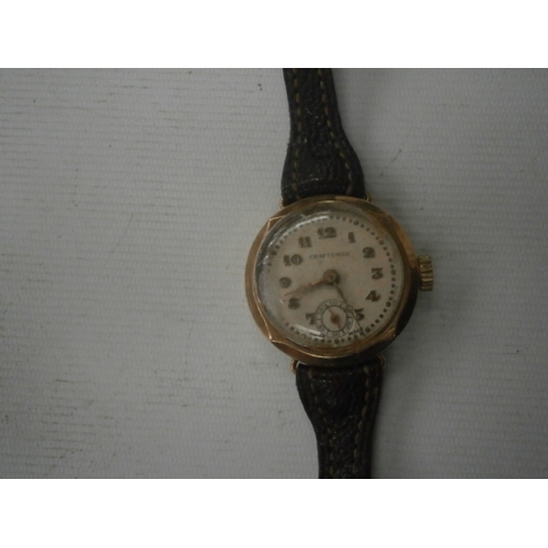 228 - Victorian 9ct gold denison watch with leather strap total weight 17.5G