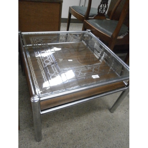 663 - Decorative glass top table with chromed frame