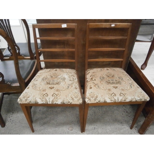 664 - Pair of retro teak dining chairs