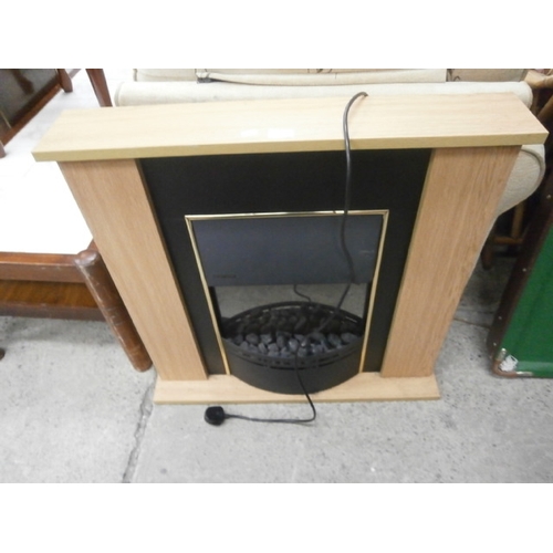 665 - DIMPLEX electric convector fire in light oak surround