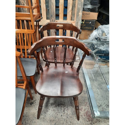 685 - A pair of captains chairs