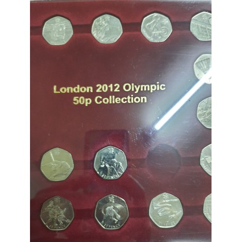 210 - The London 2012 Olympic 50p coin collection with 28 coins