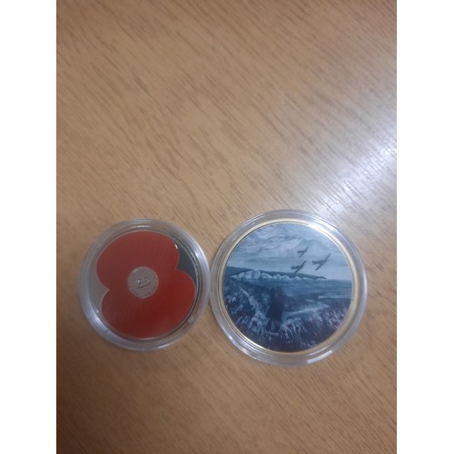 216 - A war poppy collection coin & poppy £5 coin