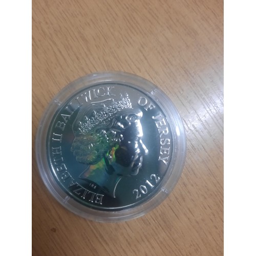 216 - A war poppy collection coin & poppy £5 coin