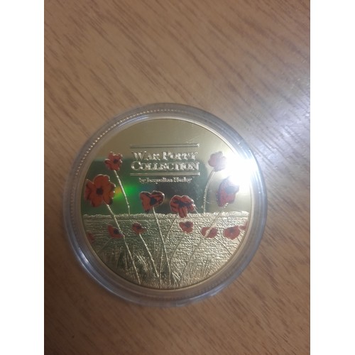 216 - A war poppy collection coin & poppy £5 coin