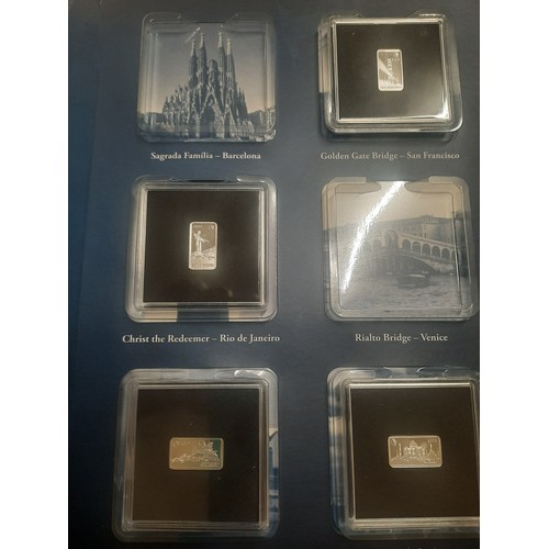 203 - The landmarks of the world silver bar collection with 10 small half dollar silver bars with original... 