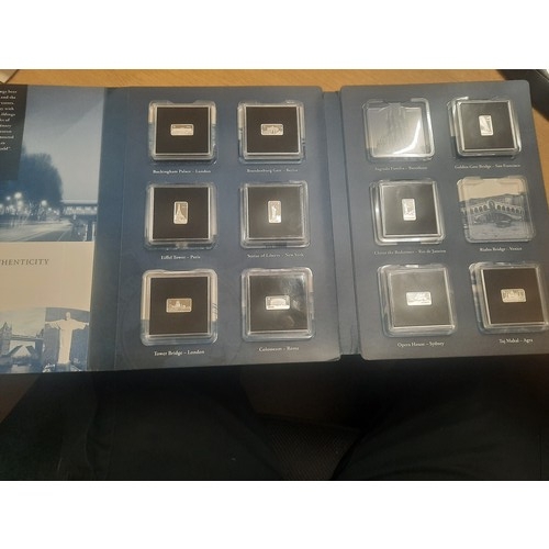 203 - The landmarks of the world silver bar collection with 10 small half dollar silver bars with original... 