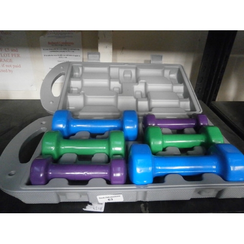 63 - Cased dumbbell set