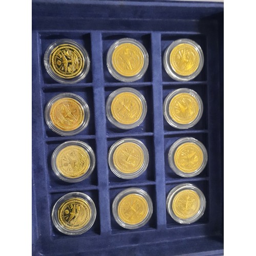 238 - The legendary aircraft brass coin collection with 24 coins in blue case