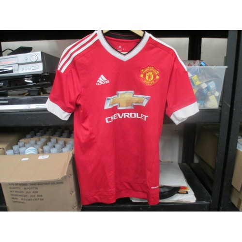 87 - Collection of football shirts, mostly Manchester United