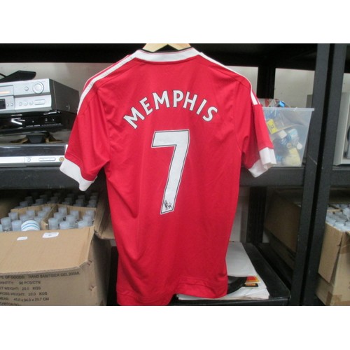 87 - Collection of football shirts, mostly Manchester United