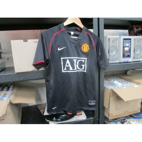 87 - Collection of football shirts, mostly Manchester United