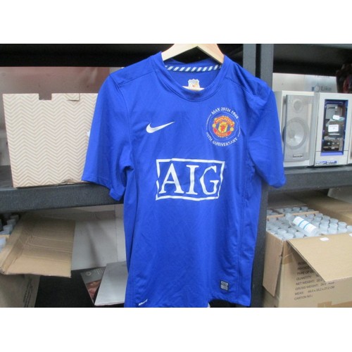 87 - Collection of football shirts, mostly Manchester United