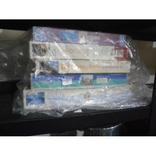 67 - Bag of jigsaw puzzles