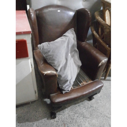 624 - Vintage leather wing back chair for repair