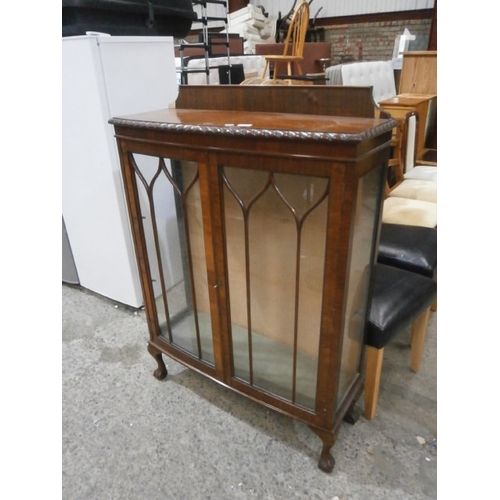 700 - Bow front antique mahogany display cabinet with rope twist edging and ball and claw feet