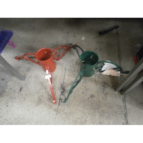 196 - Two metal Christmas tree stands