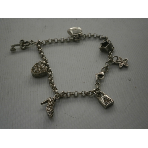 353 - Silver hallmarked charm bracelet with silver charms