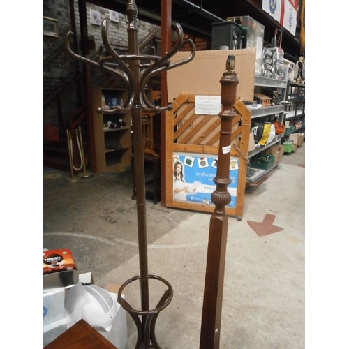 713 - A vintage carved standard lamp stand and a vintage coat stand