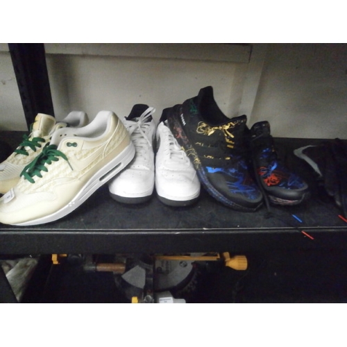 52 - Two pairs of Nike trainers, size 9.5 and pair of Adidas Disney adult, size 9.5