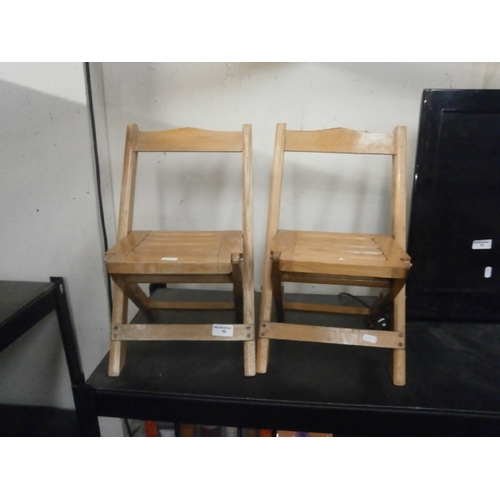 56 - Two small wooden chairs